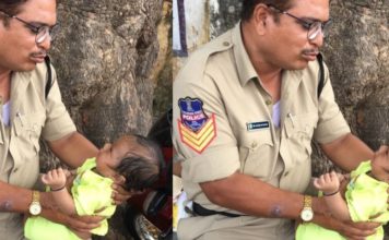 അമ്മ പരീക്ഷ ഹോളിൽ; കരഞ്ഞ കുഞ്ഞിന് താരാട്ട് പാടി പോലീസ് ഉദ്യോഗസ്ഥന് സോഷ്യൽ മീഡിയയുടെ കയ്യടി..!!